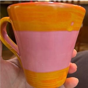 A pink and orange Vietri mug.